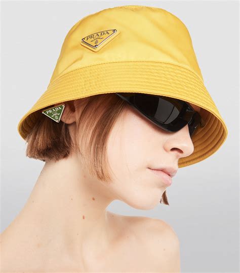 prada bucket hat light blue|yellow Prada bucket hat.